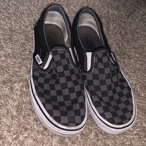 Gray and black checkered vans